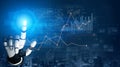 Futuristic robotic hand interacting with digital graphs and charts showcasing data analysis and technology advancement Royalty Free Stock Photo