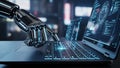 A robotic hand touching a glowing keyboard on a laptop displaying futuristic digital interfaces and data charts Royalty Free Stock Photo