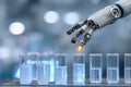 Robotic hand working in laboratory with test tubes and clear liquid during the science experiment in modern Royalty Free Stock Photo
