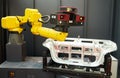 Robotic industry. Robot with 3D sensor scanner measures surface of detail in automotive industry