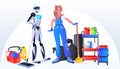 robotic janitor with woman cleaner robot vs human standing together cleaning service artificial intelligence technology