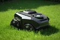 Robotic Lawnmower Cutting Fresh Green Grass. Perfect for Landscaping Projects.