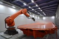 robotic painting and coating system, with a view of the factory floor, in action