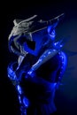 robotic spacesuit with blue lights and transparent sheets, futuristic armor Royalty Free Stock Photo