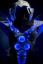 robotic spacesuit with blue lights and transparent sheets, futuristic armor Royalty Free Stock Photo