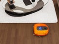 Robotic vacuum cleaner moving on flooring