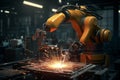 Robotic Welding. Robots welding in workshop of industrial plant.