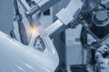 The robotics arm welding the automotive parts. Royalty Free Stock Photo