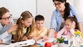 Stem education. Children studying at robotic class, making notes