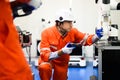 Robotics controller engineers working and solving problems on machine Royalty Free Stock Photo