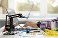 robotics engineer programming robot arm