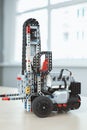Robotics. Robot car on table isoalated close-up modern technology blurred