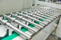 Robotized automated conveyor for detail supply into cnc machining center Royalty Free Stock Photo