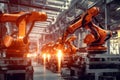 Robots in a factory doing work Royalty Free Stock Photo