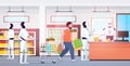 Robots and people standing line queue to robotic cashier artificial intelligence technology concept modern supermarket Royalty Free Stock Photo