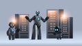 robots in server room big cloud data analysis artificial intelligence technology concept Royalty Free Stock Photo