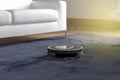 Robots vacuums cleaners on carpet in living room to cleaning pet hair and dust