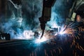 Robots are welding in car factory