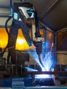 Robots welding in a car factory Royalty Free Stock Photo