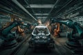 Robots in workshop of automobile plant. Automotive robotic factory. Welding Robot, assembly line production cars Manufacture. Royalty Free Stock Photo