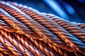 Robust Armored Copper Cable Against a Dynamic Abstract Background A Visual Representation of Industrial Strength and Royalty Free Stock Photo