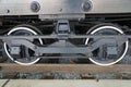 The robust support system of a train\'s undercarriage, designed for stability and smooth movement Royalty Free Stock Photo