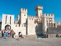 Rocca Scaligera, historical castle and old town on island, small harbor Royalty Free Stock Photo