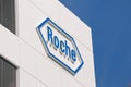 Roche sign in front at the Roche Diagnostics campus in Rotkreuz, Switzerland