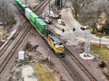 Union Pacific Railroad locomotive pulling a freight train across the double diamond tracks Royalty Free Stock Photo