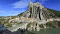 Unusual shaped rock and bridge over Durance river in Sisteron, France