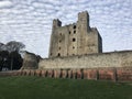 Rochester Castle surrounded by cumulus clouds in Kent, United Kingdom Royalty Free Stock Photo