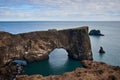 Rock arch in Atlantic ocean, Iceland Royalty Free Stock Photo