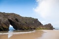 Rock arch on San Antolin beach, Spain Royalty Free Stock Photo