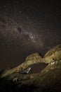 Rock arch under stars