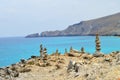 Rocks or stone balancing vertical towers with pebble/rocks. Mountain and sea background Royalty Free Stock Photo