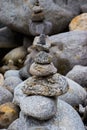 Rock Balancing having flowing river in the background Royalty Free Stock Photo