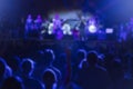 Rock band concert - defocused crowd and performers Royalty Free Stock Photo