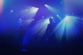 Rock band silhouettes on stage at concert. Royalty Free Stock Photo