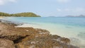 Rock beach and clear seawater Royalty Free Stock Photo