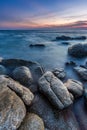 Rock beach in Rayong, Thailand at sunset - Lan Hin Khao Royalty Free Stock Photo