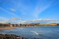 Rock and beach at Stonehaven bay on Sunny day