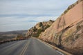 Rock bordered road leading up to Mt. Scott near Lawton Oklahoma. Royalty Free Stock Photo