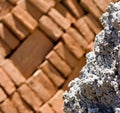 Rock with brick background Royalty Free Stock Photo