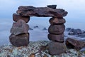 Rock cairn on the lakeshore