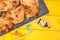 Rock cakes party food in close up with party popper streamer. Si