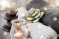 Rock, candle and towel in a spa for zen to relax in a stress free empty room with aromatherapy ambience. Luxury, salon Royalty Free Stock Photo