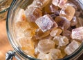 Rock candy brown sugar in glass Royalty Free Stock Photo