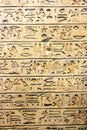 rock-carved tabula cutout with egyptian hieroglyphs