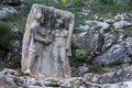 The rock carving at Arsameia in eastern Turkey depicting King Antiochus shaking hands with Hercules.