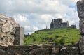 Rock of Cashel castle with fields around it and cloudy sky Royalty Free Stock Photo